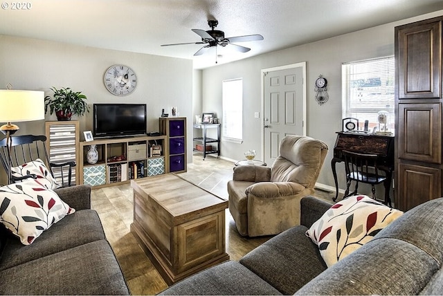 1693 N Sheperd Rd Unit 14, Washougal, WA 98671 - living room with ceiling fan and baseboards