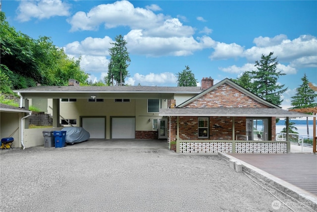 31111 53rd Ave SW, Federal Way, WA 98023 - view of front of property with a chimney, brick siding, driveway, and an attached garage
