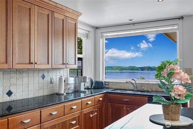 31111 53rd Ave SW, Federal Way, WA 98023 - kitchen with a sink, healthy amount of natural light, brown cabinets, and backsplash
