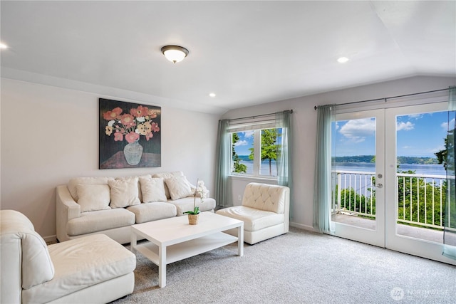 31111 53rd Ave SW, Federal Way, WA 98023 - living room featuring lofted ceiling, french doors, carpet, recessed lighting, and a water view