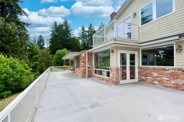 31111 53rd Ave SW, Federal Way, WA 98023 - view of patio / terrace featuring a balcony and french doors