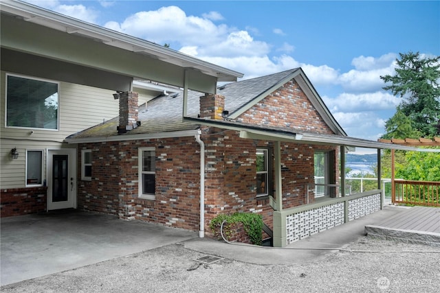 31111 53rd Ave SW, Federal Way, WA 98023 - view of home's exterior featuring brick siding and roof with shingles