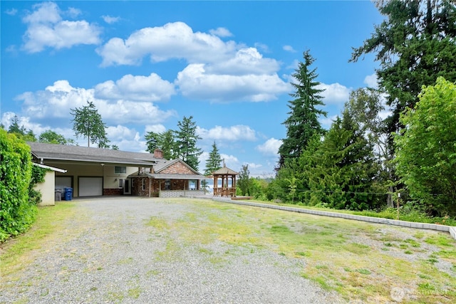 31111 53rd Ave SW, Federal Way, WA 98023 - view of yard featuring driveway, a gazebo, and a carport