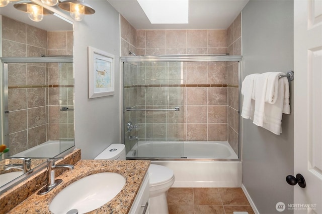 6513 156th Ave SE, Bellevue, WA 98006 - bathroom with toilet, vanity, shower / bath combination with glass door, and tile patterned floors