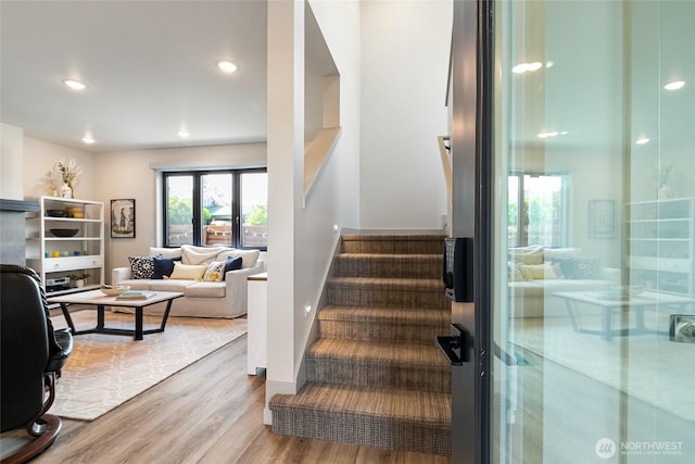 4260 Creston Way, Bellingham, WA 98226 - stairway with wood finished floors, recessed lighting, and baseboards
