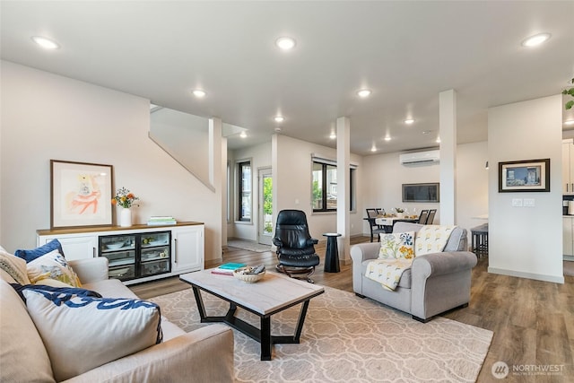 4260 Creston Way, Bellingham, WA 98226 - living area featuring a wall mounted AC, wood finished floors, recessed lighting, and baseboards
