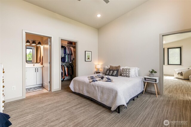 4260 Creston Way, Bellingham, WA 98226 - carpeted bedroom with a spacious closet, a closet, connected bathroom, recessed lighting, and baseboards