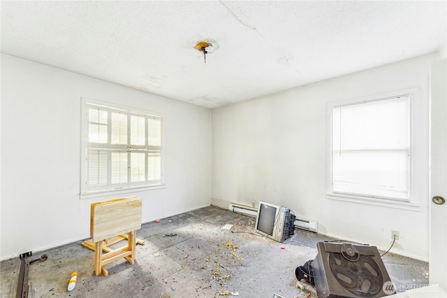 99 Sumner Ave, Sumner, WA 98390 - empty room featuring baseboard heating
