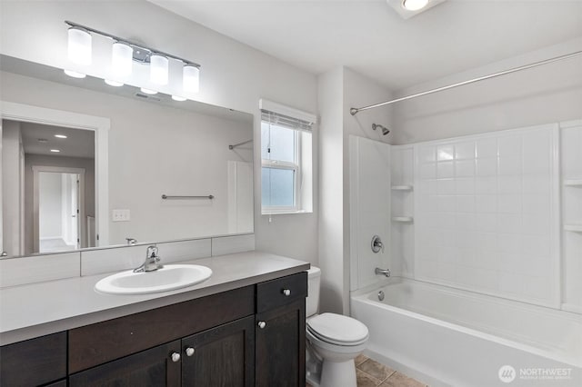 2719 Fiddleback St NE, Lacey, WA 98516 - bathroom featuring vanity,  shower combination, tile patterned flooring, and toilet