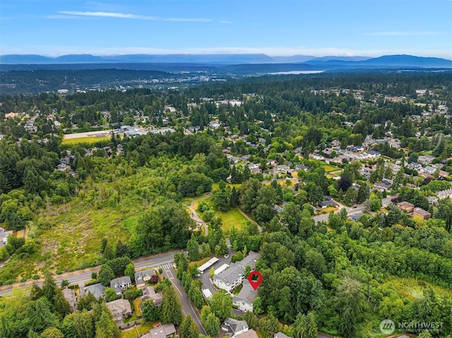 12315 NE 97th St Unit G, Kirkland, WA 98033 - bird's eye view of mountains and a heavily wooded area