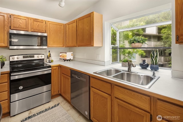 12315 NE 97th St Unit G, Kirkland, WA 98033 - kitchen with stainless steel appliances, light countertops, and lofted ceiling