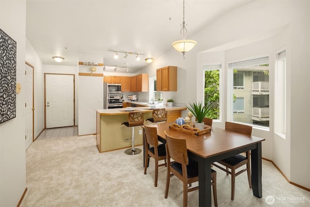 12315 NE 97th St Unit G, Kirkland, WA 98033 - dining space featuring lofted ceiling and light carpet