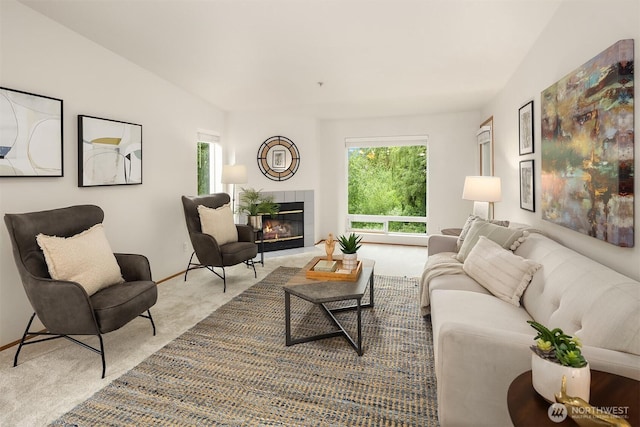 12315 NE 97th St Unit G, Kirkland, WA 98033 - carpeted living area with a fireplace and baseboards