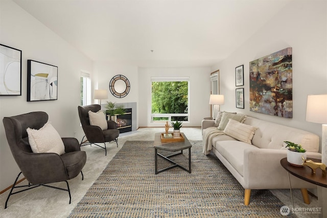 12315 NE 97th St Unit G, Kirkland, WA 98033 - carpeted living area featuring healthy amount of natural light and a fireplace