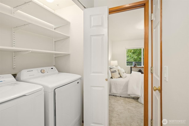 12315 NE 97th St Unit G, Kirkland, WA 98033 - laundry room with separate washer and dryer and light carpet