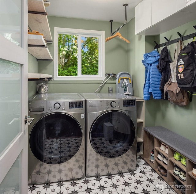 13117 NE 128th Pl NE, Kirkland, WA 98034 - laundry area with washer and dryer, light flooring, and cabinet space