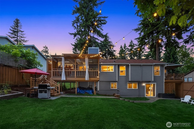 13117 NE 128th Pl NE, Kirkland, WA 98034 - back of property with stairs, a chimney, and a wooden deck