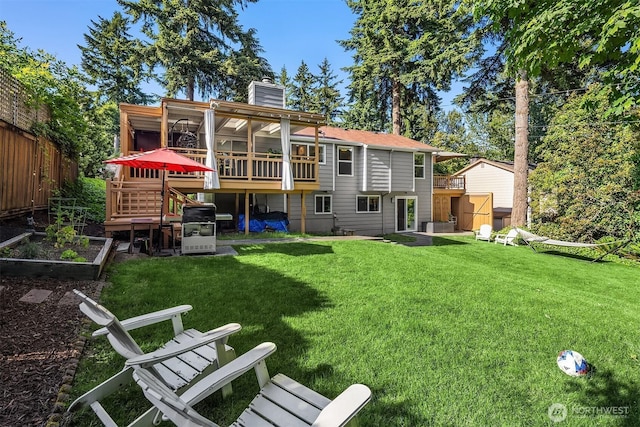 13117 NE 128th Pl NE, Kirkland, WA 98034 - back of house featuring a garden, a chimney, and a wooden deck