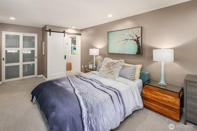 13117 NE 128th Pl NE, Kirkland, WA 98034 - bedroom featuring a barn door, carpet flooring, recessed lighting, and baseboards