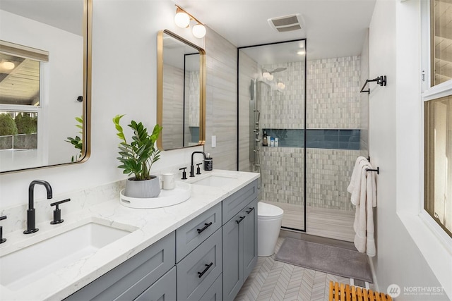 13117 NE 128th Pl NE, Kirkland, WA 98034 - full bath featuring double vanity, a stall shower, toilet, and tile patterned floors