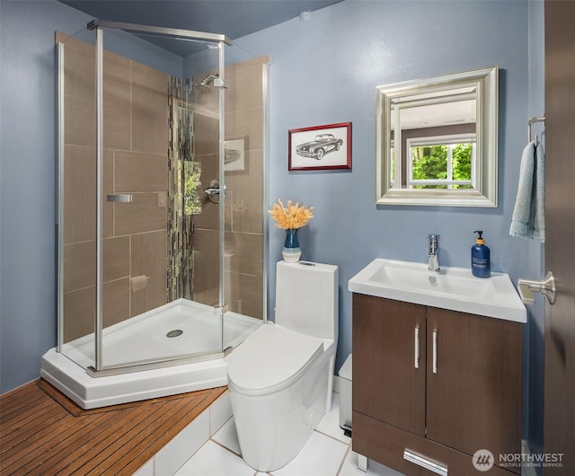 13117 NE 128th Pl NE, Kirkland, WA 98034 - bathroom featuring toilet, a shower stall, vanity, and tile patterned floors