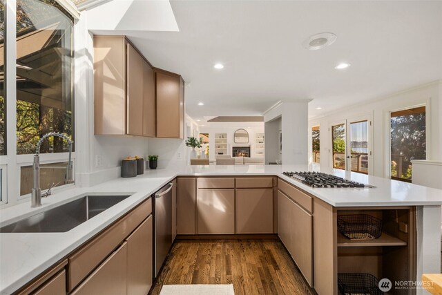16939 SE 39th St, Bellevue, WA 98008 - kitchen featuring stainless steel appliances, a sink, dark wood-style flooring, light countertops, and recessed lighting