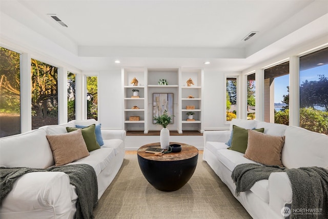 16939 SE 39th St, Bellevue, WA 98008 - living room featuring healthy amount of natural light, a tray ceiling, and recessed lighting