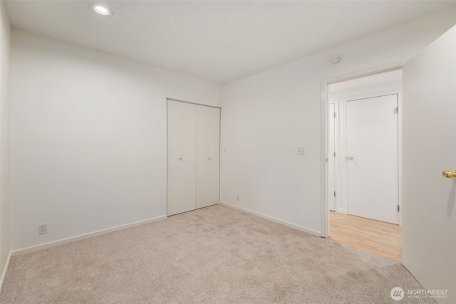 16939 SE 39th St, Bellevue, WA 98008 - unfurnished bedroom featuring carpet flooring, baseboards, recessed lighting, and a closet