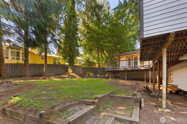 16939 SE 39th St, Bellevue, WA 98008 - view of yard featuring a deck, stairs, and a vegetable garden
