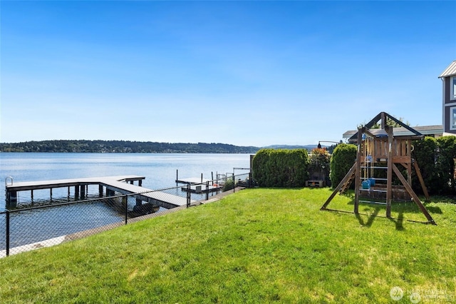 16939 SE 39th St, Bellevue, WA 98008 - dock area featuring a lawn, a water view, and a playground