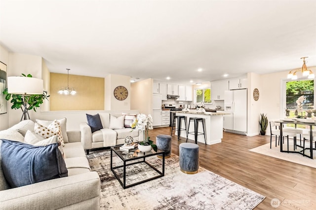 404 Veralene Way SW, Everett, WA 98203 - living area with a chandelier, recessed lighting, and wood finished floors