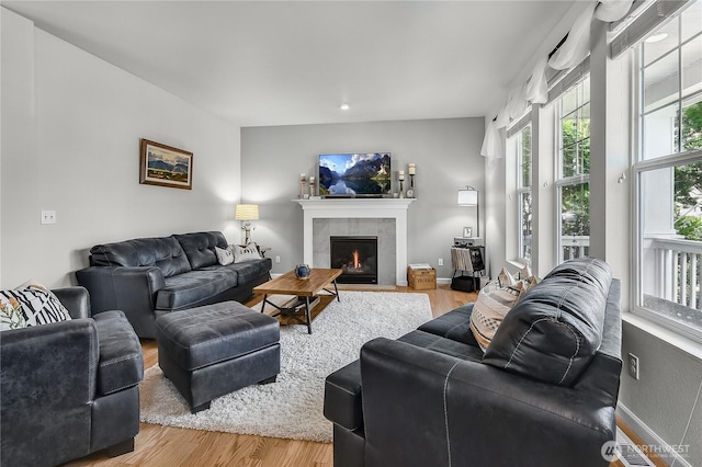 8354 22nd St NE, Lake Stevens, WA 98258 - living room with a fireplace and wood finished floors