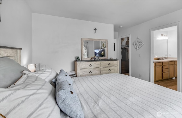 8354 22nd St NE, Lake Stevens, WA 98258 - bedroom featuring a spacious closet, ensuite bathroom, and a closet