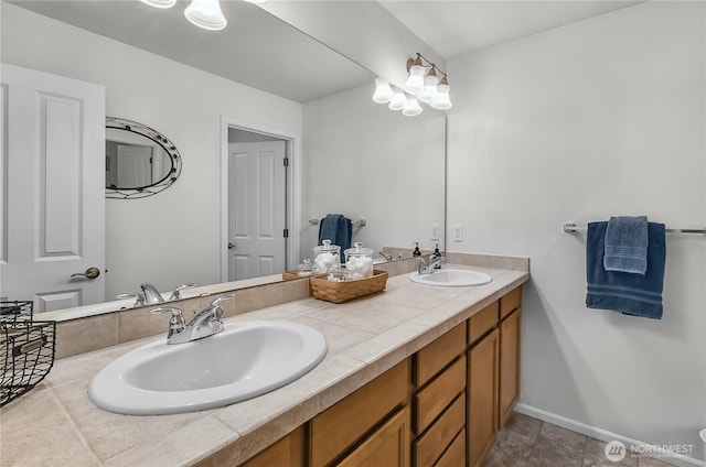 8354 22nd St NE, Lake Stevens, WA 98258 - full bathroom featuring double vanity and baseboards
