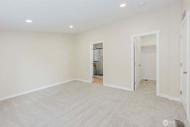 270 Granat St, Port Orchard, WA 98366 - unfurnished bedroom with light carpet, a spacious closet, recessed lighting, and baseboards
