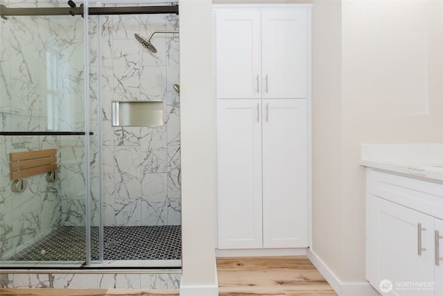 270 Granat St, Port Orchard, WA 98366 - full bathroom with a marble finish shower, wood finished floors, and vanity