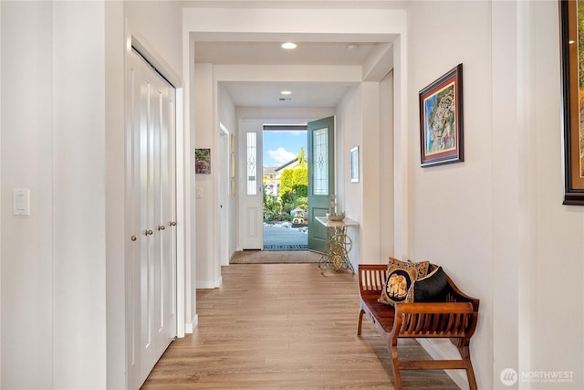 70 Ida Ct, Sequim, WA 98382 - hallway featuring light wood-type flooring, recessed lighting, and baseboards