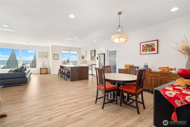 70 Ida Ct, Sequim, WA 98382 - dining area featuring light wood finished floors and recessed lighting