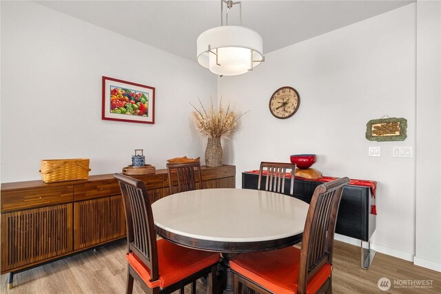 70 Ida Ct, Sequim, WA 98382 - dining area with wood finished floors and baseboards