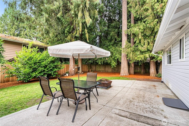 26600 Weaver Ave NW, Poulsbo, WA 98370 - fenced backyard with a fire pit and a patio area