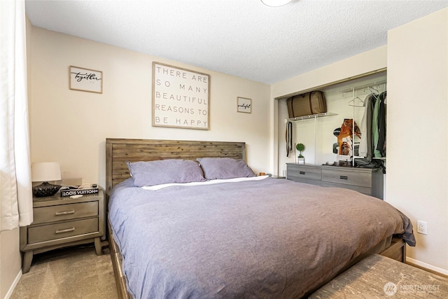 26600 Weaver Ave NW, Poulsbo, WA 98370 - carpeted bedroom with baseboards and a textured ceiling