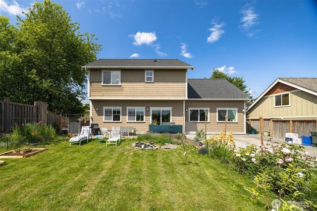 5695 Meadow View Dr, Ferndale, WA 98248 - back of property with a patio and a trampoline