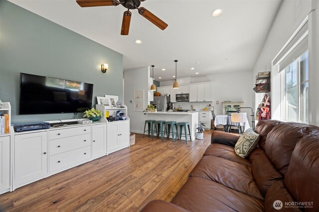 5695 Meadow View Dr, Ferndale, WA 98248 - living room with light wood-style flooring, ceiling fan, and recessed lighting