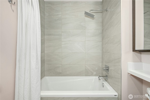 1760 NW 56th St Unit 608, Seattle, WA 98107 - bathroom featuring shower / bath combo with shower curtain