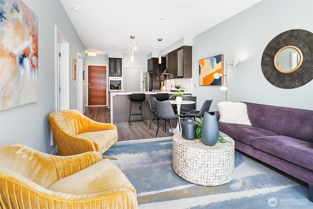 1760 NW 56th St Unit 608, Seattle, WA 98107 - living room with light wood-style floors