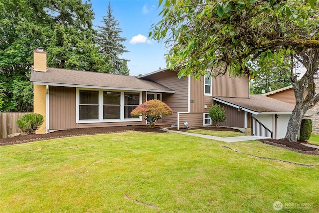 14208 NE 73rd St, Redmond, WA 98052 - back of house featuring a chimney and a garage
