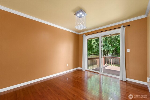 14208 NE 73rd St, Redmond, WA 98052 - spare room featuring hardwood / wood-style floors, baseboards, and ornamental molding