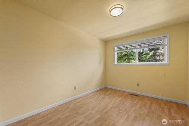 14208 NE 73rd St, Redmond, WA 98052 - empty room with baseboards and light wood-style flooring