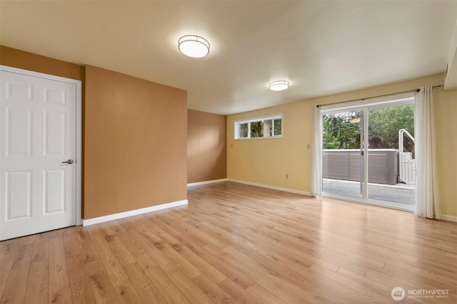 14208 NE 73rd St, Redmond, WA 98052 - spare room with light wood-style floors and baseboards