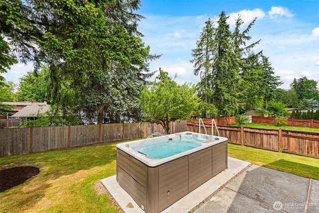 14208 NE 73rd St, Redmond, WA 98052 - view of swimming pool with a hot tub and a patio